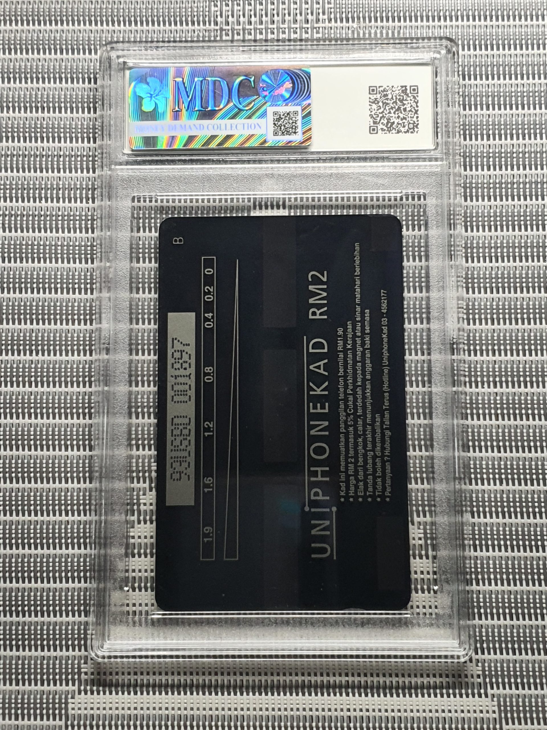 1992 Malaysia Uniphonekad RM2 "Jackie Chan-Supercop"《 MDC Graded 7.5 》 - Image 2
