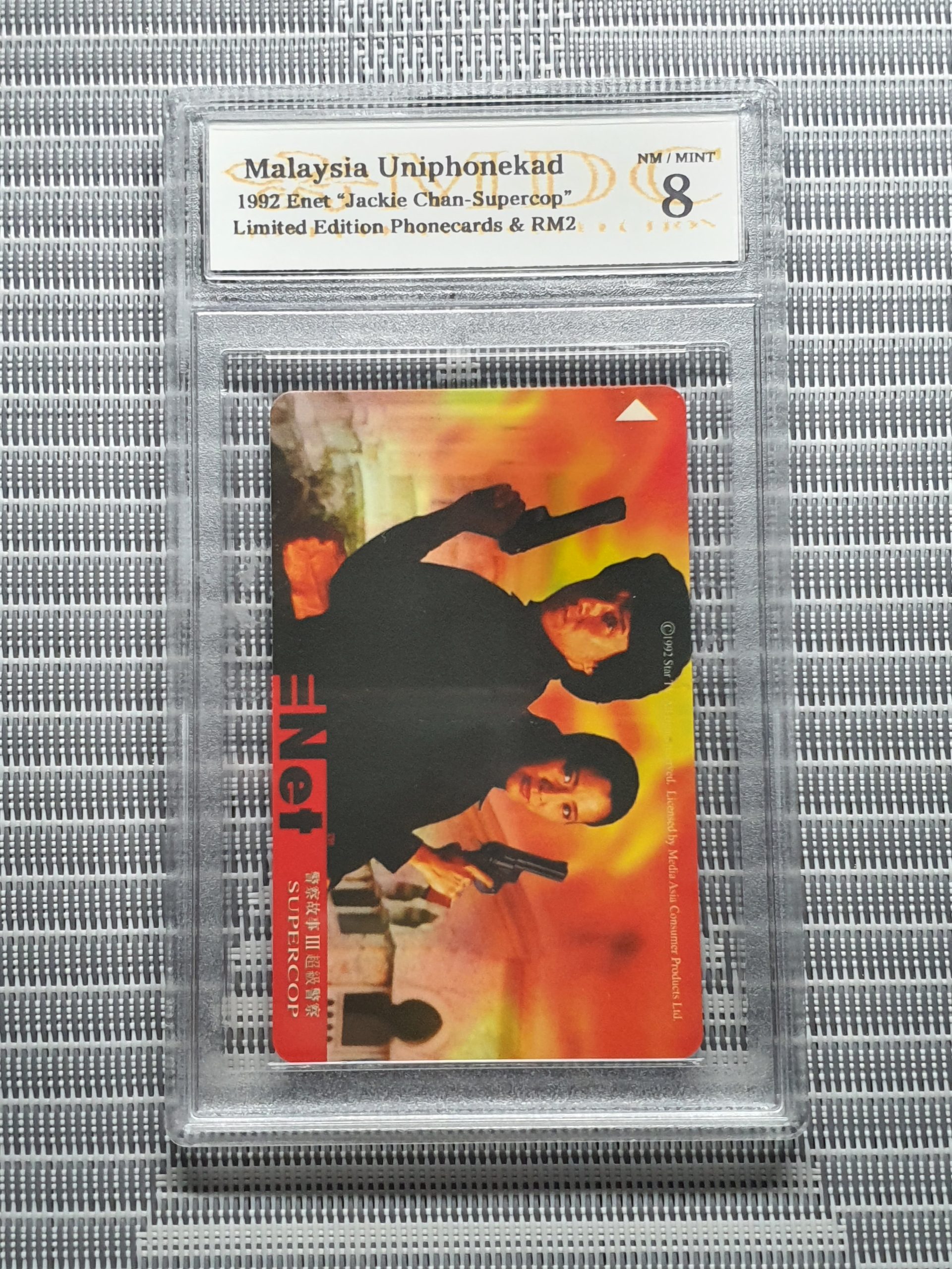 1992 Malaysia Uniphonekad RM2 "Jackie Chan-Supercop"《 MDC Graded 8 》